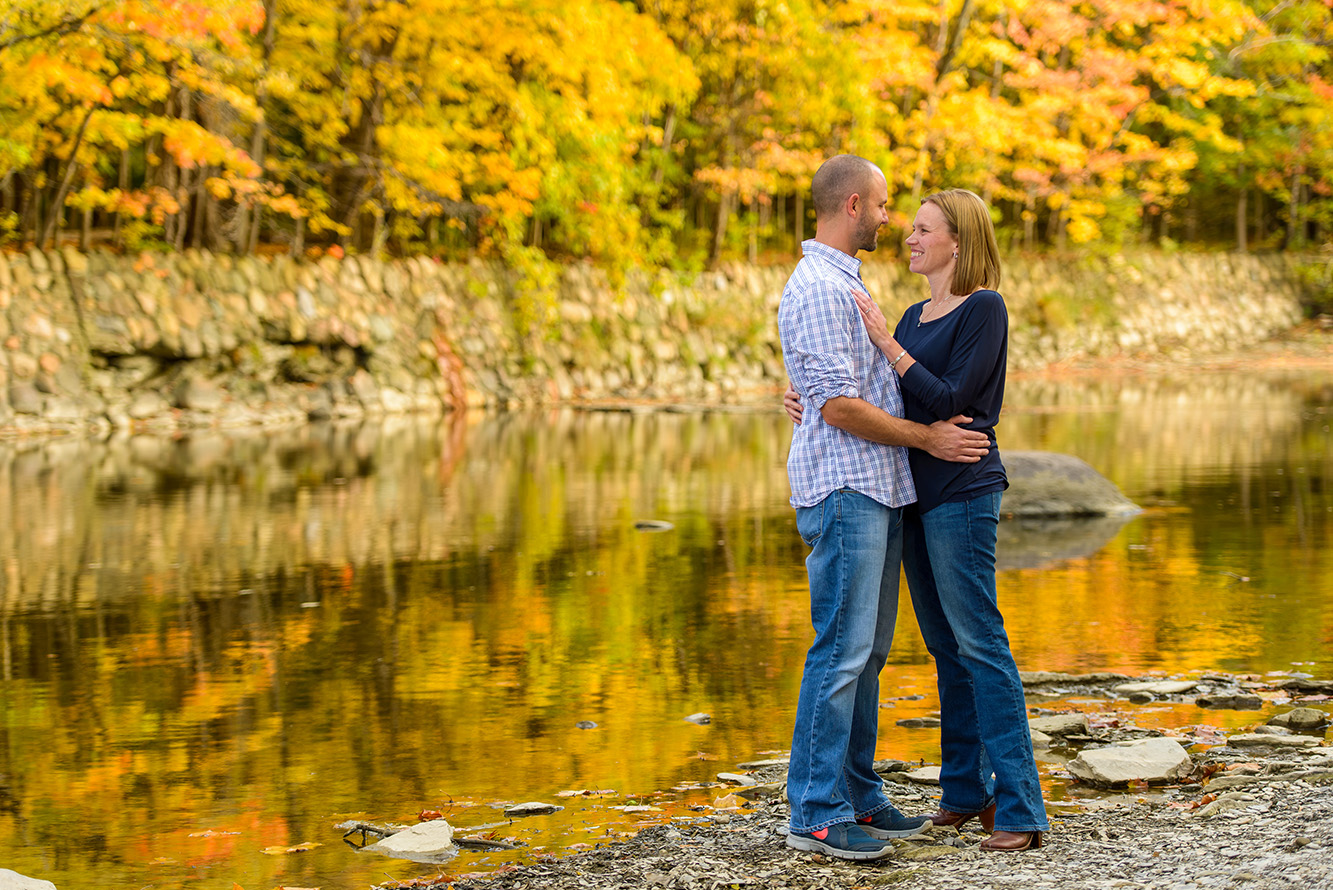 Couple along Rocky River with Fall Color